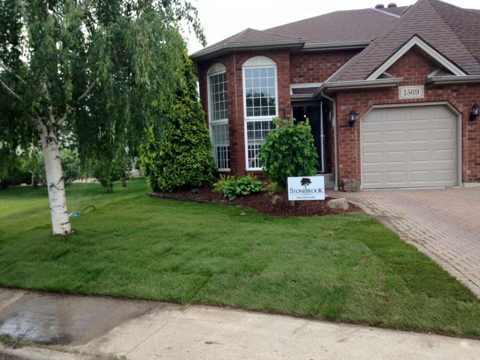 Stonebrook landscaping sign on residential work.